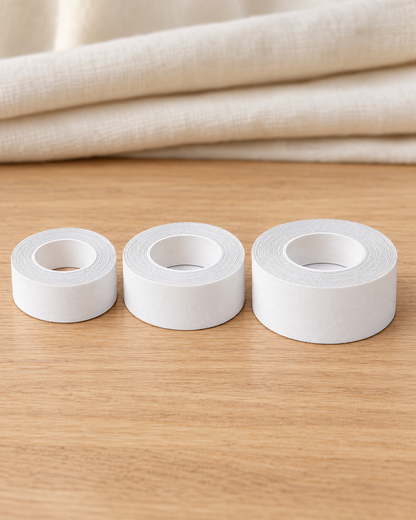 Three rolls of white hem tape in 1 cm, 2 cm and 3 cm widths