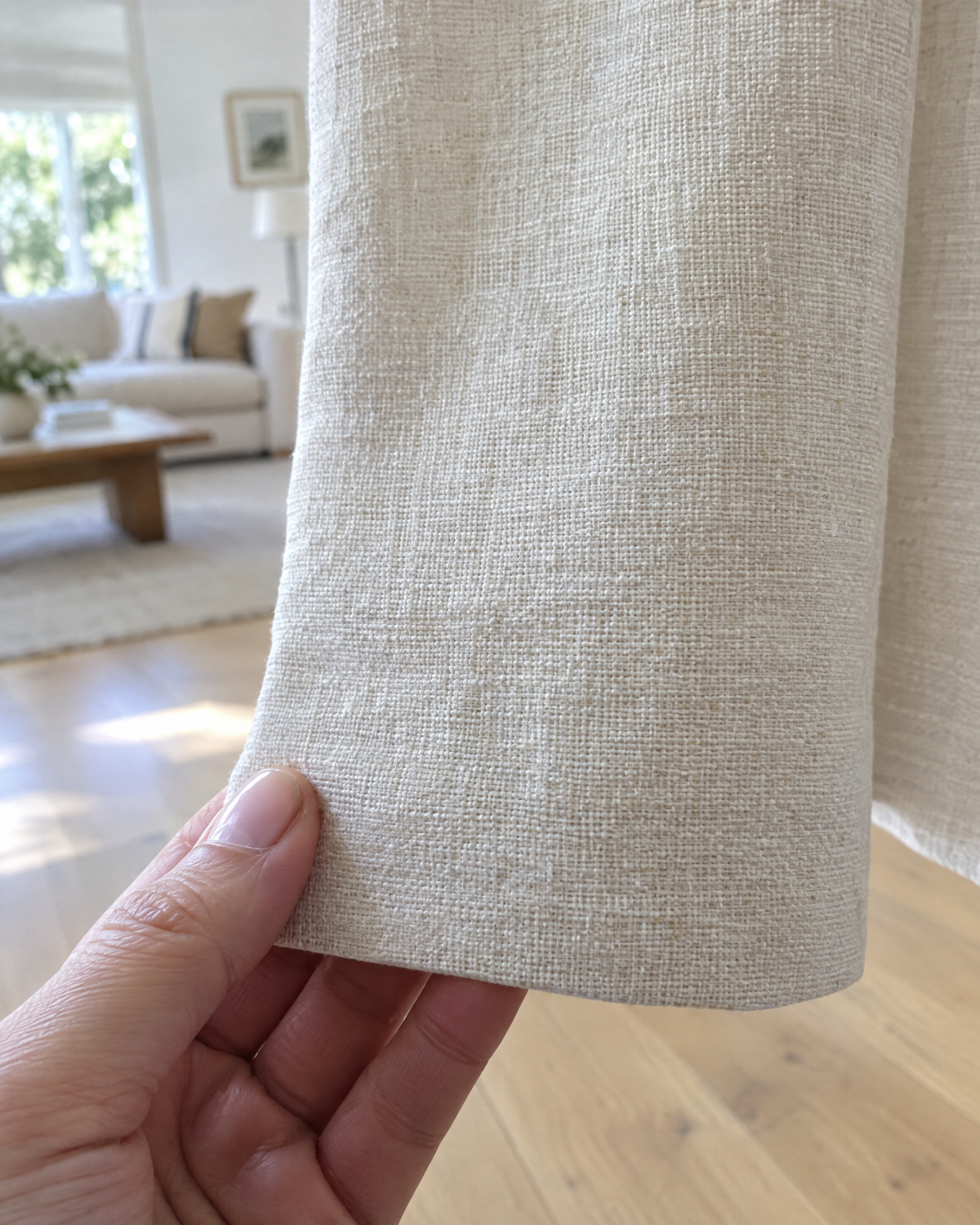 Close-up of a curtain hem with no stitches showing